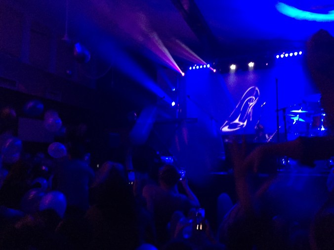 a balloon drop in a small rock venue